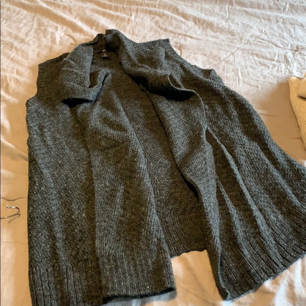Gray sleeveless cardigan style vest